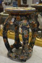 A Chinese Imari style pottery seat.