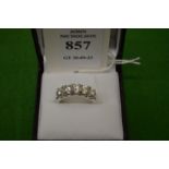 A good 18ct white gold and diamond five stone ring, size O.