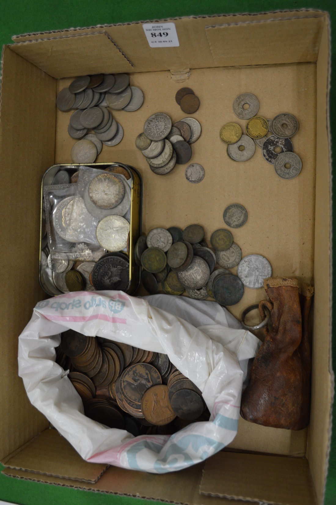 A quantity of pre-decimal and other coins.