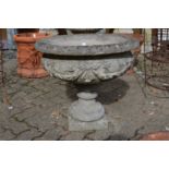 A good large reconstituted stone pedestal urn shaped planter.