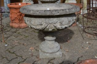 A good large reconstituted stone pedestal urn shaped planter.