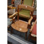 A good Victorian elm seated armchair.