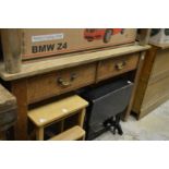 A good large pine work table with drawers to each side.