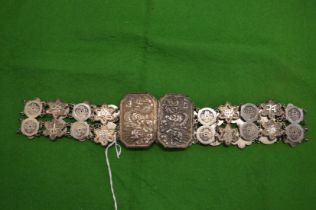 A Chinese silver 'coin' belt.