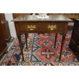 An 18th century oak single drawer side table.