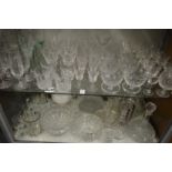 A large quantity of glassware to include decanters, bowls etc.