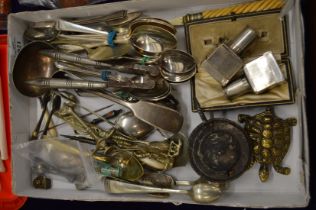 A small collection of plated items to include button hook, sugar tongs etc.