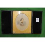 A leather cased miniature/photograph of a lady.