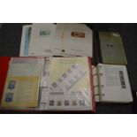 A box containing a folder of Australian stamps etc together with catalogues etc.