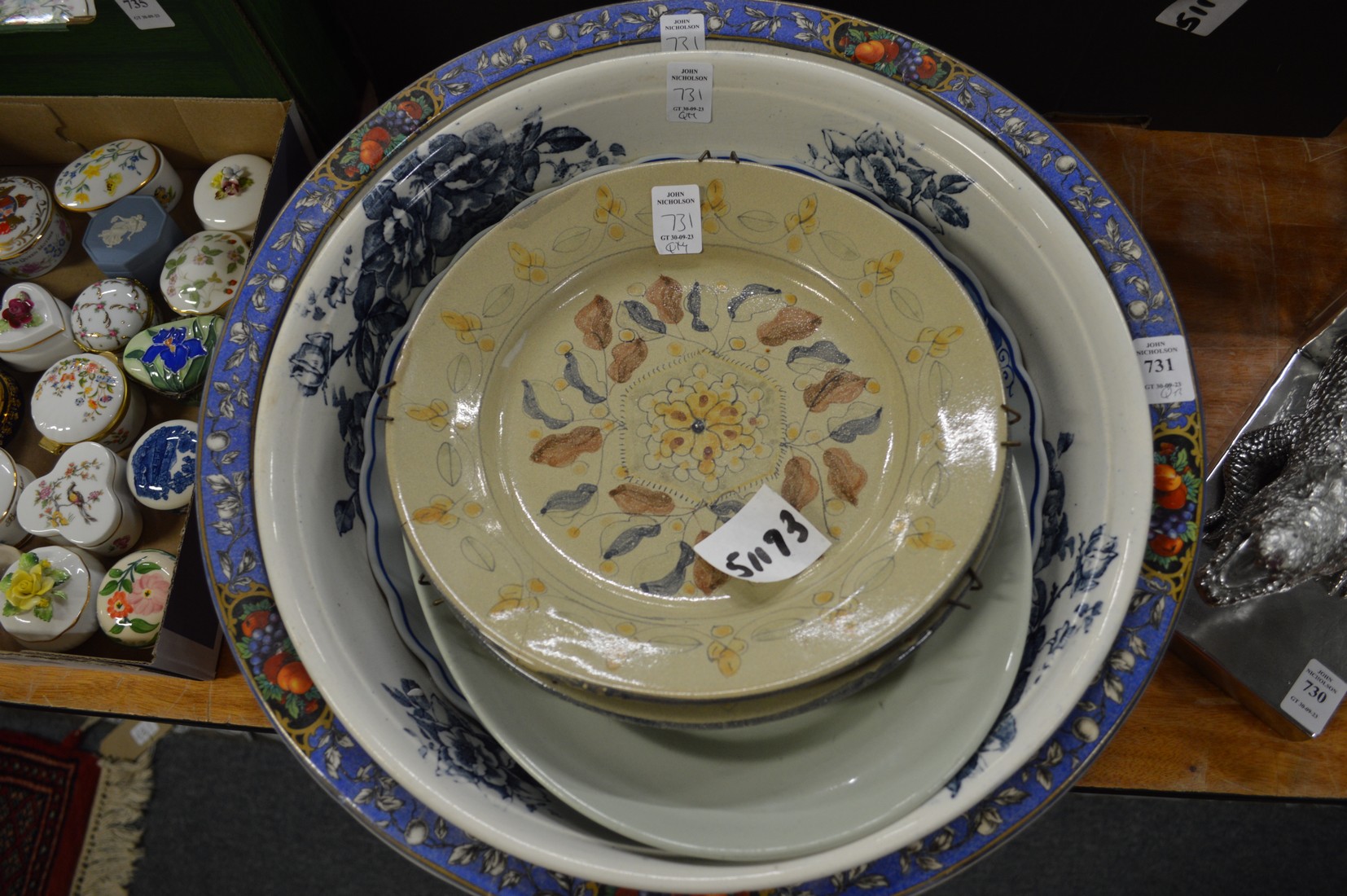 Large pottery bowls and plates.