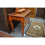 A Victorian mahogany Pembroke table.