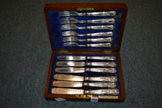 A cased set of six plated fish knives and forks.