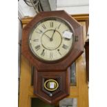 A mahogany cased drop dial wall clock.