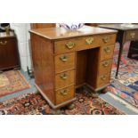 A good 18th century oak small kneehole desk.