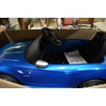 Child's battery operated BMW Z4 car, boxed.