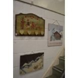 Three decoratively painted signs/pictures.