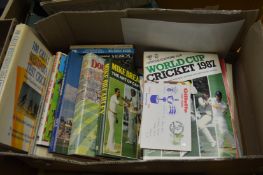 A quantity of cricket relating books etc.