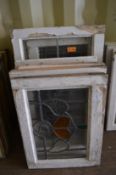 Ten various framed leaded lights with stained glass decoration.