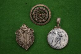 Hardstone pendant and other items.