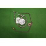 A plated pocket watch with two Albert chains.