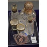 Silver top dressing table jar, small intaglio engraved glass dish and other items.