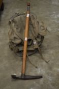 An old mountaineering axe together with an early rucksack.