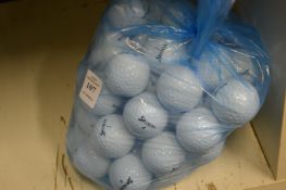 A bag of fifty Srixon golf balls.