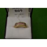 A 9ct gold and gem set ring, size L.