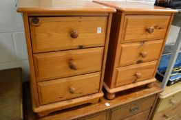 Two pine three drawers bedside chests.