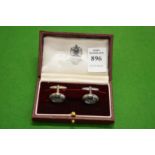 A cased pair of Asprey cufflinks.