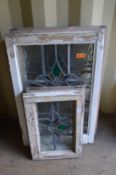 Four large and two small framed leaded lights with stained glass decoration.