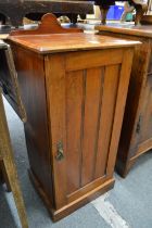 A Victorian walnut pot cupboard.