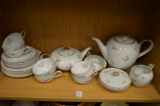 A quantity of floral decorated teaware.