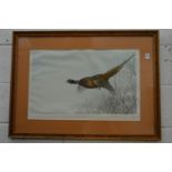 Leon Danchin, A pheasant in flight, colour print, pencil signed together with a colour print after