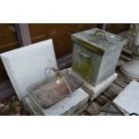 A galvanised trough and a galvanised square shape storage bucket with lid.