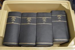 A set of four German chemistry books.