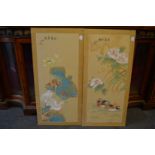 A pair of painted Chinese screens.
