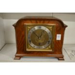 An Elliott walnut cased mantle clock.