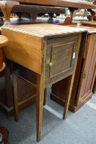 A mahogany drop flap pot cupboard.