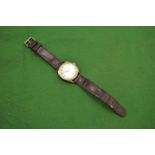 A Gentleman's Paris automatic wristwatch with leather strap.