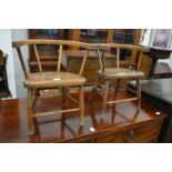 A good pair of child's Windsor type stick back chairs.