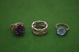 Three decorative rings.