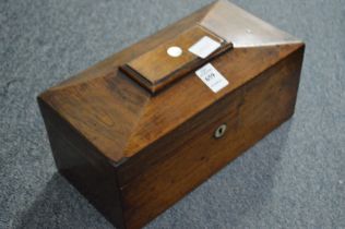 A Victorian rosewood sarcophagus shaped tea caddy.