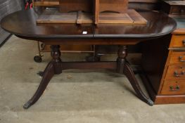 A reproduction dining table.