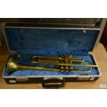 A cased trumpet.