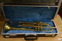 A cased trumpet.