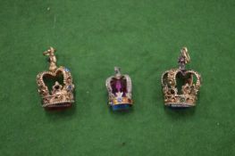 Three unusual pendants modelled as crowns.