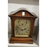 A large oak cased mantle clock.