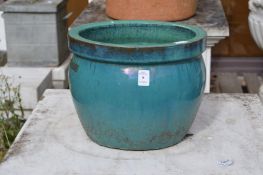 A glazed plant pot.