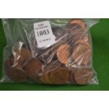 A quantity of pre-decimal half penny coins.